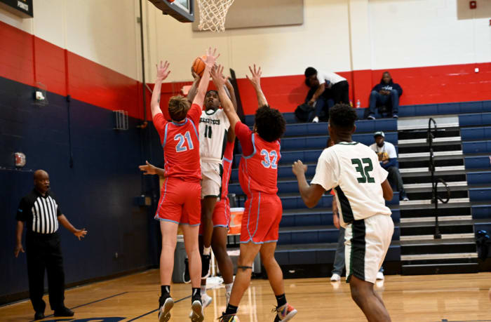 Kwasi Edge from Albany Green Tech fights through the Rockledge defense during the fifth-place game at the Kingdom in the Sun Tournament at Vanguard High School in Ocala.